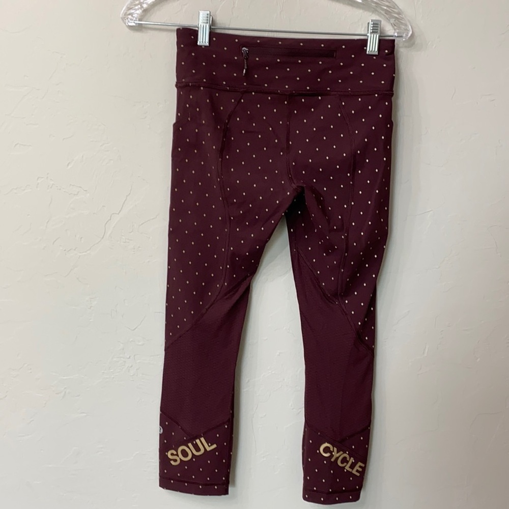 Lululemon Soul cycle crop maroon & gold leggings size 4.
